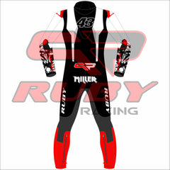 Back view of the Jack Miller Yamaha MotoGP 2025 custom race suit featuring the number 43, Ruby Racing branding on legs and collar, red calf armor, and custom illustrated graphics on the arms – designed for professional motorcycle racing