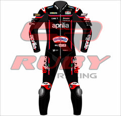 Front profile of the Jorge Martin Aprilia 2025 MotoGP race suit in a bold black and red design, packed with sponsor logos including Sterilgarda, Aprilia Racing, Piaggio Group, Sky WiFi, and MotoGP, with RUBY branding on the collar and arms