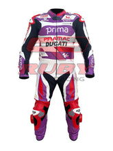 Front view of the 2023 Ducati Pramac MotoGP Racing Leather Suit worn by Jorge Martin. The suit features a bold purple, red, and white design with sponsor logos, including Prima, Pramac, and Ducati. Equipped with protective knee and elbow pads, this high-performance suit is designed for professional motorcycling safety