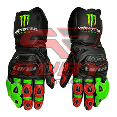 Front View of Monster Energy Racing Gloves featuring black design with vibrant green and red accents, Monster Energy logo on the wrist, and protective padding on knuckles and fingers. Durable materials ensure excellent grip and control for professional racers and motorsport fans