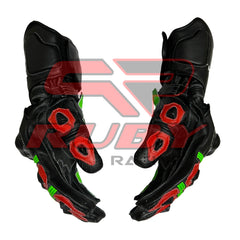 Side Grip View of Monster Energy Racing Gloves featuring black design with vibrant green and red accents, Monster Energy logo on the wrist, and protective padding on knuckles and fingers. Durable materials ensure excellent grip and control for professional racers and motorsport fans