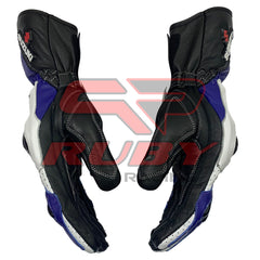 A pair of Suzuiki GSXR motorcycle racing gloves shown from the palm side, highlighting the black leather construction with detailed stitching. The gloves feature adjustable straps around the wrists for a secure fit and reinforced padding on the palms and fingers for enhanced grip and protection while riding.