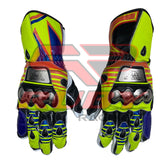A pair of Valentino Rossi 2016 MotoGP racing gloves featuring a bold and vibrant design with yellow, blue, red, and black accents. These gloves include reinforced knuckles and metallic plates, offering both protection and a signature style that reflects Rossi's 2016 MotoGP season