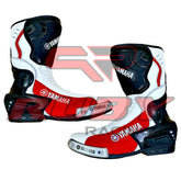 Yamaha red and white leather motorcycle boots designed for racing with reinforced toe sliders and flexible movement.