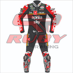 Front view of the 2024 Aleix Espargaro Aprilia Racing suit for the British GP, featuring a sleek black and red design with detailed sponsor logos, including Aprilia, Sky, Michelin, and Ruby. The suit is customized for Aleix Espargaro, with graphic elements on the legs and arms reflecting his racing identity.