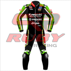 Front view of the Axel Bassani Kawasaki Racing Team suit for the 2024 WSBK season. The suit is primarily black with vibrant green and yellow accents. The Kawasaki Racing Team logo is prominently displayed on the chest, along with other sponsor logos such as Motul, Shoya, and Provec Racing.