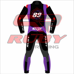 Back view of Jorge Martin's 2025 MotoGP racing suit from the Barcelona winter test. The suit features a striking combination of blue, white, and red with black accents. The number 89 is prominently displayed on the chest and back. Various sponsor logos are present, including Pramac Racing and Ducati. The suit includes protective padding on the knees and elbows, with additional branding on the arms and legs. The design reflects a sleek, modern aesthetic tailored for high-performance racing.