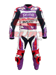 Front view of the 2023 Ducati Pramac MotoGP Racing Leather Suit worn by Jorge Martin. The suit features a bold purple, red, and white design with sponsor logos, including Prima, Pramac, and Ducati. Equipped with protective knee and elbow pads, this high-performance suit is designed for professional motorcycling safety