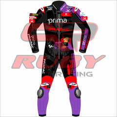 Front view of Jorge Martin's MotoGP racing suit from the Barcelona winter test. Features a bold design with black, purple, red, and white accents, sponsor logos from Pramac Racing and Ducati, and protective padding on knees and elbows. Number 89 is displayed prominently on the suit."