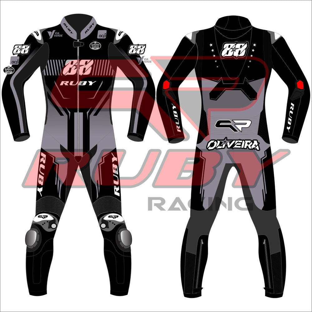 Full front and back view of Miguel Oliveira's 2025 MotoGP test race suit designed by Ruby Racing, featuring bold Ruby logos, sponsor badges, and black-grey color scheme.