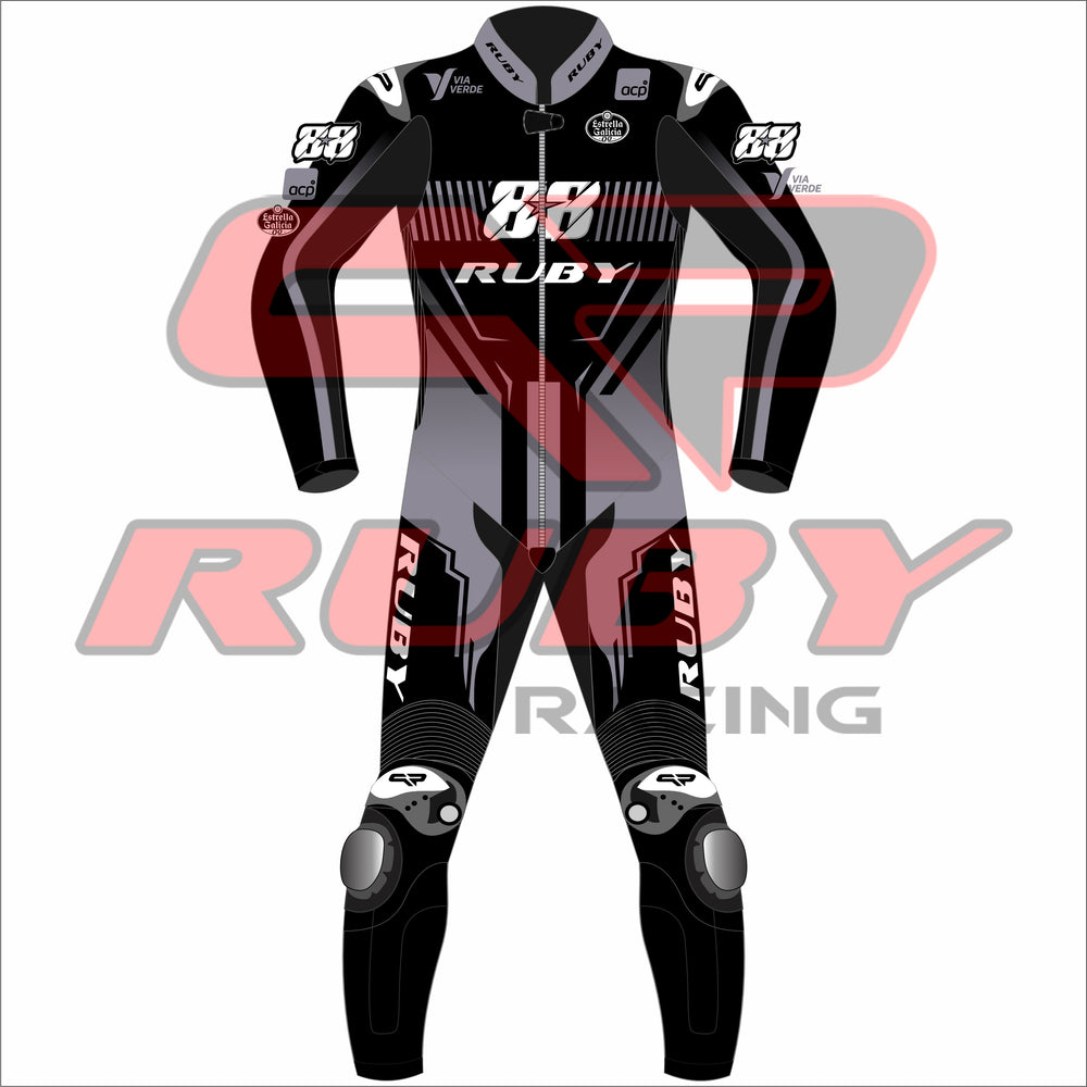 Front view of Miguel Oliveira's 2025 MotoGP test race suit in black and grey tones, detailed with Ruby Racing branding and sponsor placements.