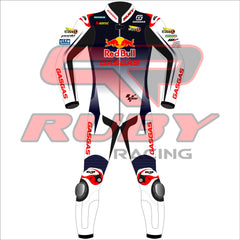 Front view of the Pedro Acosta Red Bull Gasgas racing suit for the 2024 British GP. The suit is predominantly white with black and red details, featuring logos from sponsors like Red Bull, GASGAS, Motul, Michelin, and Tech3. The design includes protective knee and elbow sliders, with the rider's initials 'acosta' displayed on the back.