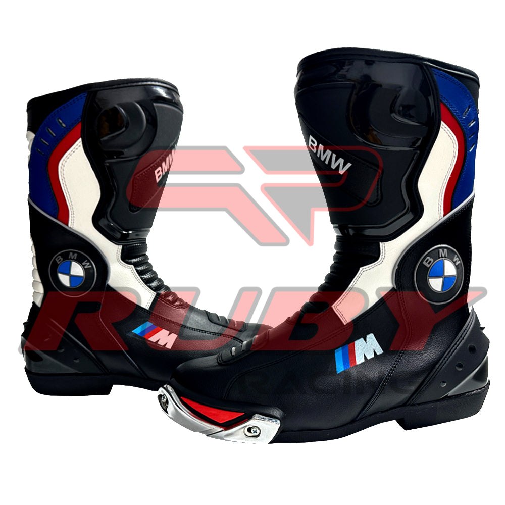 Front angle of BMW Motorrad motorcycle boots in black and blue design, showing steel toe sliders, flexible leather panels, and CE-certified protection.