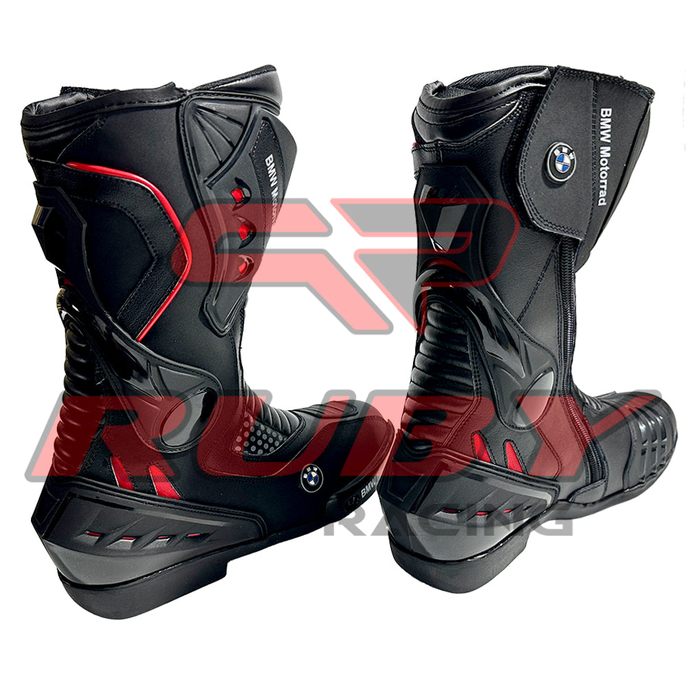Front view of BMW Motorrad red black motorcycle boots showing full-grain leather finish, shin protection, and flexible accordion stretch panels.