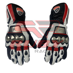 A pair of Ducati Corse racing motorbike gloves with a black, white, and red color scheme. The gloves feature protective metallic knuckle armor and padded fingers. The Ducati logo is prominently displayed on the top of each glove.