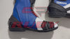 Yamaha Blue and white racing boots designed for performance riders, with reinforced heel guards and aerodynamic shaping.