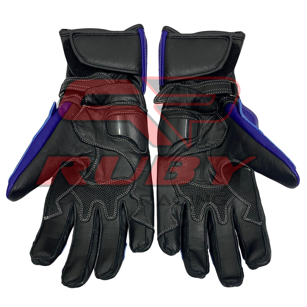 A pair of Suzuki GSX-R motorcycle racing gloves shown from the front, displaying the black and blue leather design with reinforced padding along the fingers and palms. The gloves feature secure wrist cuffs for a snug fit and detailed stitching for durability.