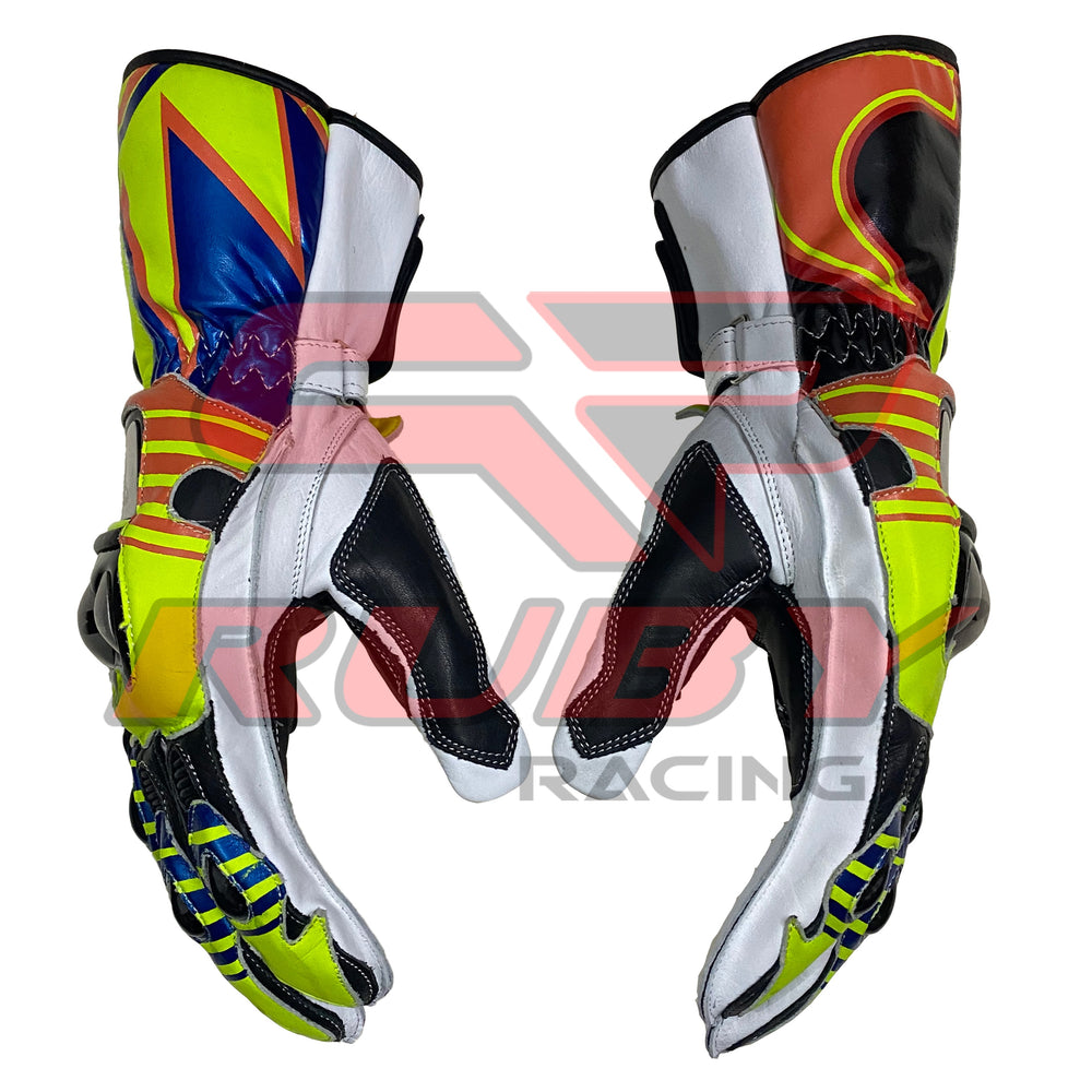 Side view of a pair of Valentino Rossi 2016 MotoGP racing gloves, highlighting their vibrant yellow, blue, red, and black design. The gloves feature reinforced fingers and ergonomic stitching, showcasing both the stylish and functional aspects of Rossi's iconic racing gear.